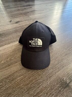 The North Face Black Mesh Trucker Hat with Logo Patch